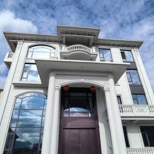 聊城白麻别墅外墙干挂石材效果示例