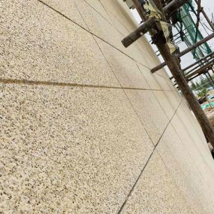 聊城 黄金麻花岗岩荔枝面外墙干挂石材效果示例