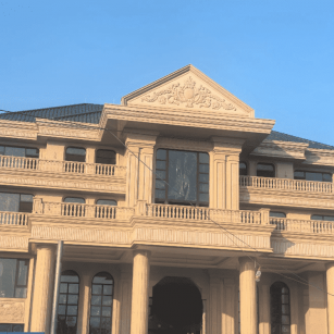 聊城黄金麻别墅外墙干挂石材效果示例